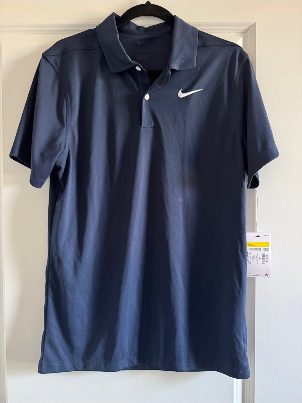 Nike Men's Navy Polo with White Swoosh